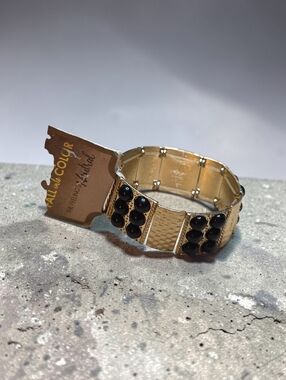 Gold Stretch Bracelet with Black Bead Accents